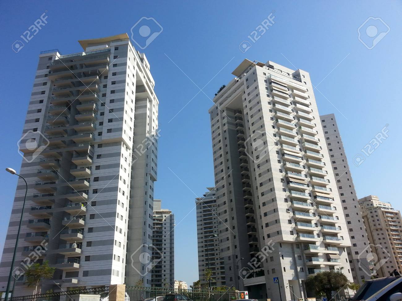 Modern, new executive apartments  buildings with deep blue summer sky